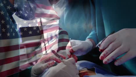 Animation-of-flag-of-usa-waving-over-surgeons-in-operating-theatre