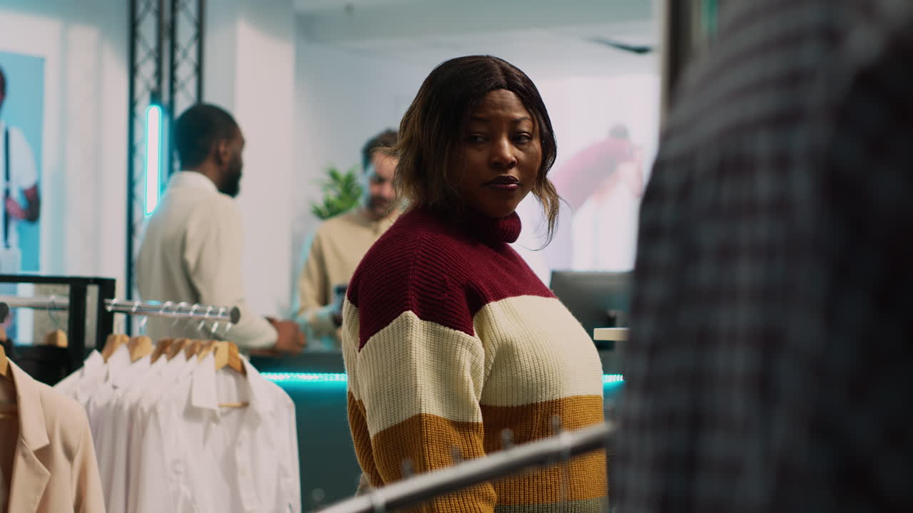 People shopping in a clothing store