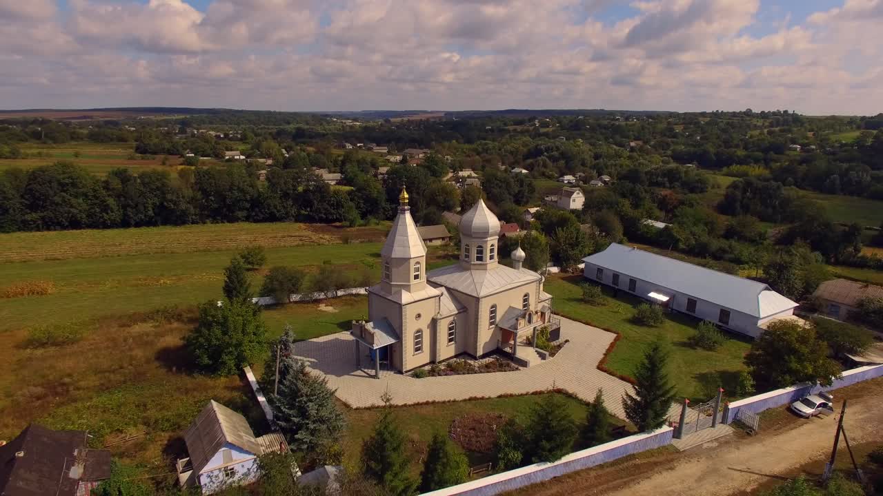Orthodox church in the Ukrainian village. Aerial view 04