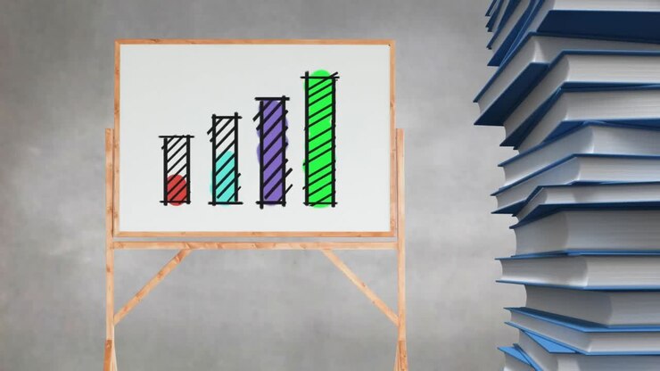 Bar graph drawing on blank canvas beside stack of books