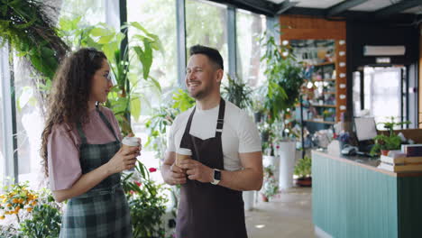 employees talking in a flower shop