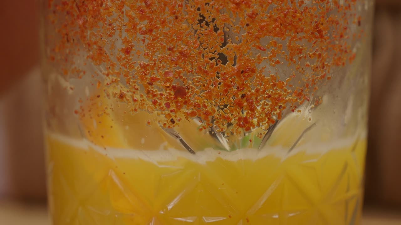 Orange Cocktail with Chili Rim