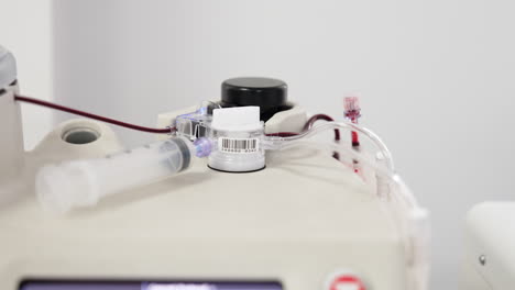 modern machine with centrifuge for plasma extraction. prp concentration preparing. close up.