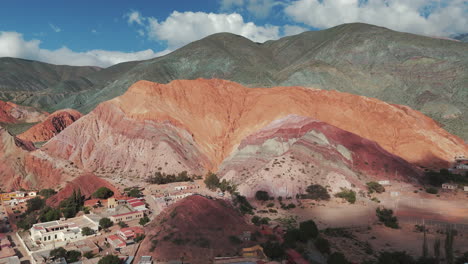 aerial drone view of cerro siete colores in purmamarca, unesco world heritage site, jujuy, argentina