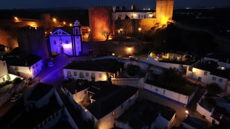 night scape of obidos skyline at obidos in leiria district portugal. medieval village. illuminated castle. stunning landscape. obidos skyline at obidos in leiria district portugal. old town scenery.