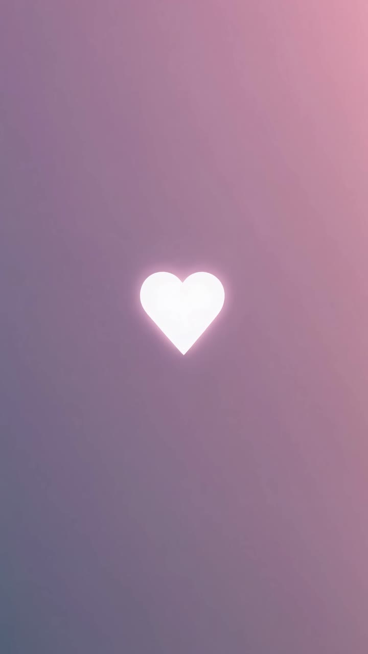 Video minimalista con un cuore luminoso al centro. Ripresa da un angolo frontale, ambientata