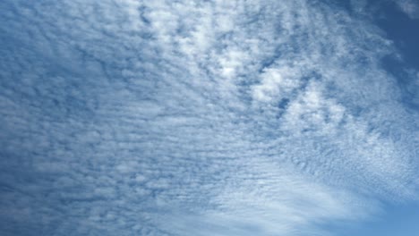 mountainous landscape with cumulus clouds