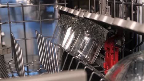 image of clear folding glasses in the dishwasher