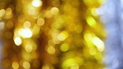 fondo de video 4k de brillo brillante abstracto. fondo de brillo dorado y blanco con textura brillante luz brillante de oro, chispas de pañuelos y fondo de aluminio brillante