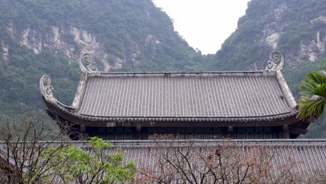 static view of an asian-style building with mountains