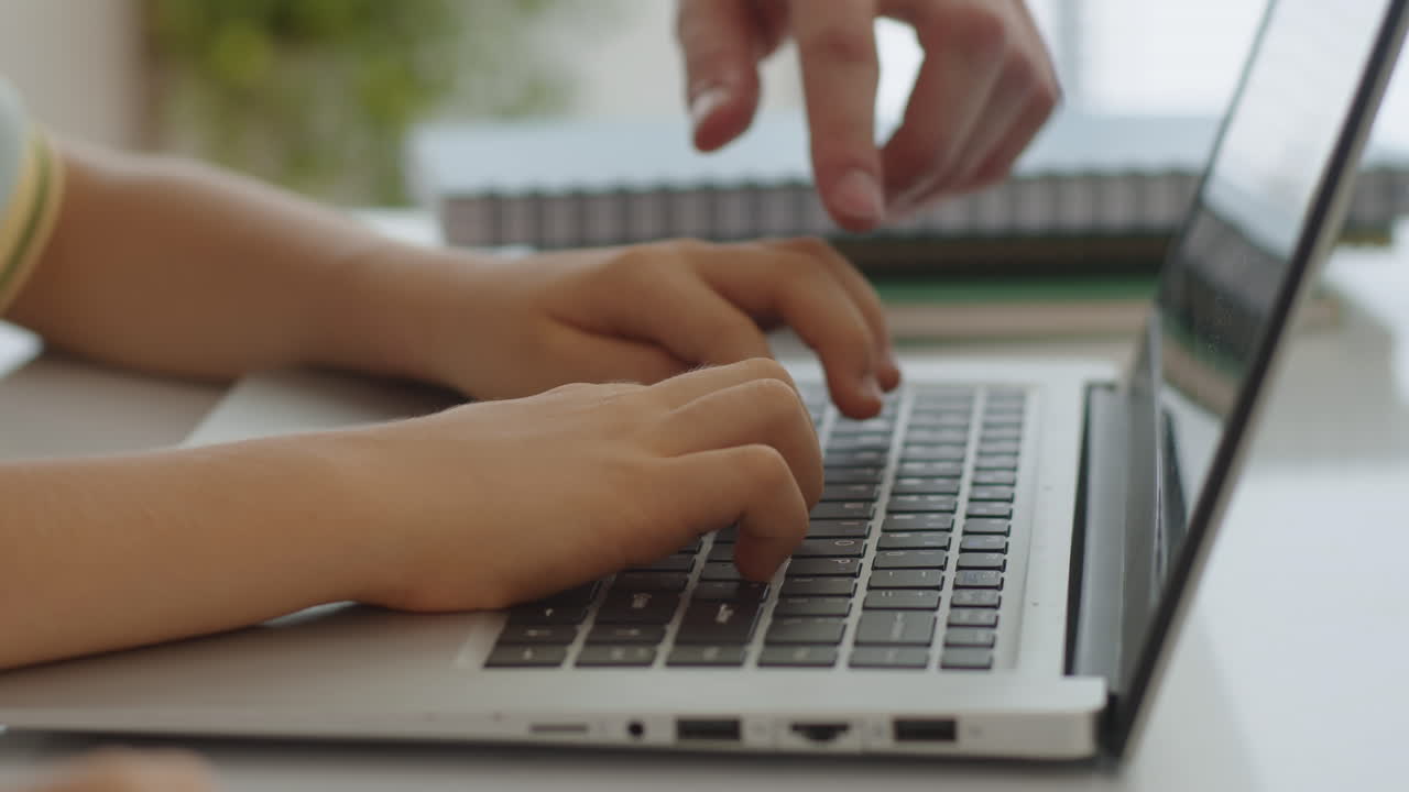 Hands of Tutor Helping Kid with Laptop at Computer Class