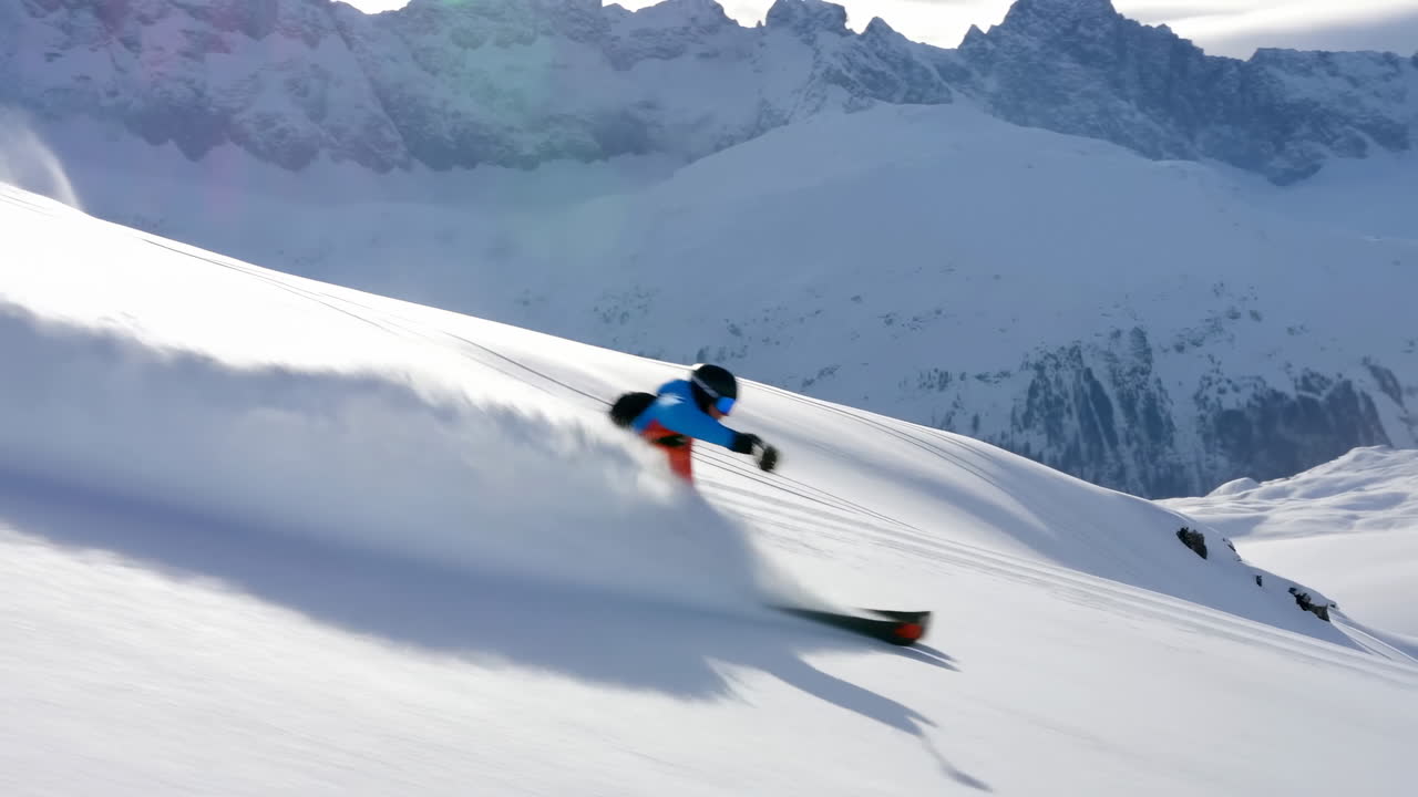 Skier Carving Fresh Powder On Alpine Slope Under Sunlit Peaks, Wearing Bright Jacket And Helmet, Dynamic