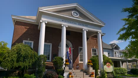 wide pan reveal of the historical museum and research library for the ontario county research society in canandaigua new york