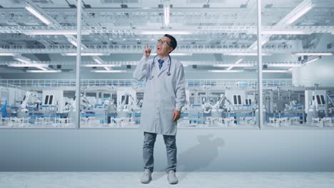 cuerpo lleno de médico masculino asiático con estetoscopio pensando en algo y mirando a su alrededor luego levantando su dedo índice en el laboratorio