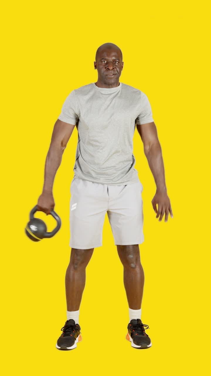 Man Demonstrating Kettlebell Exercise