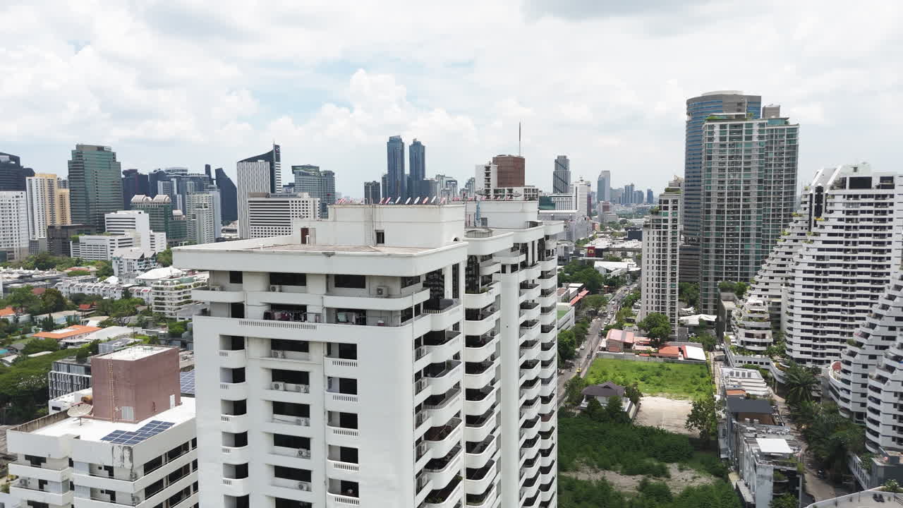 City Buildings In Phrom Phong, Bangkok, Thailand - Drone Shot