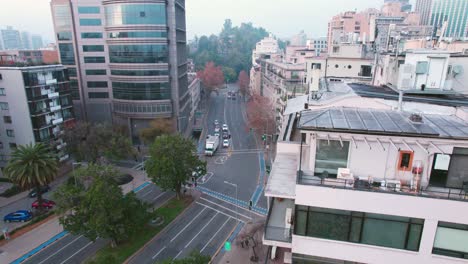 aerial drone fly above santiago chile urban area jose miguel de la barra street and santa lucia hill background at daylight