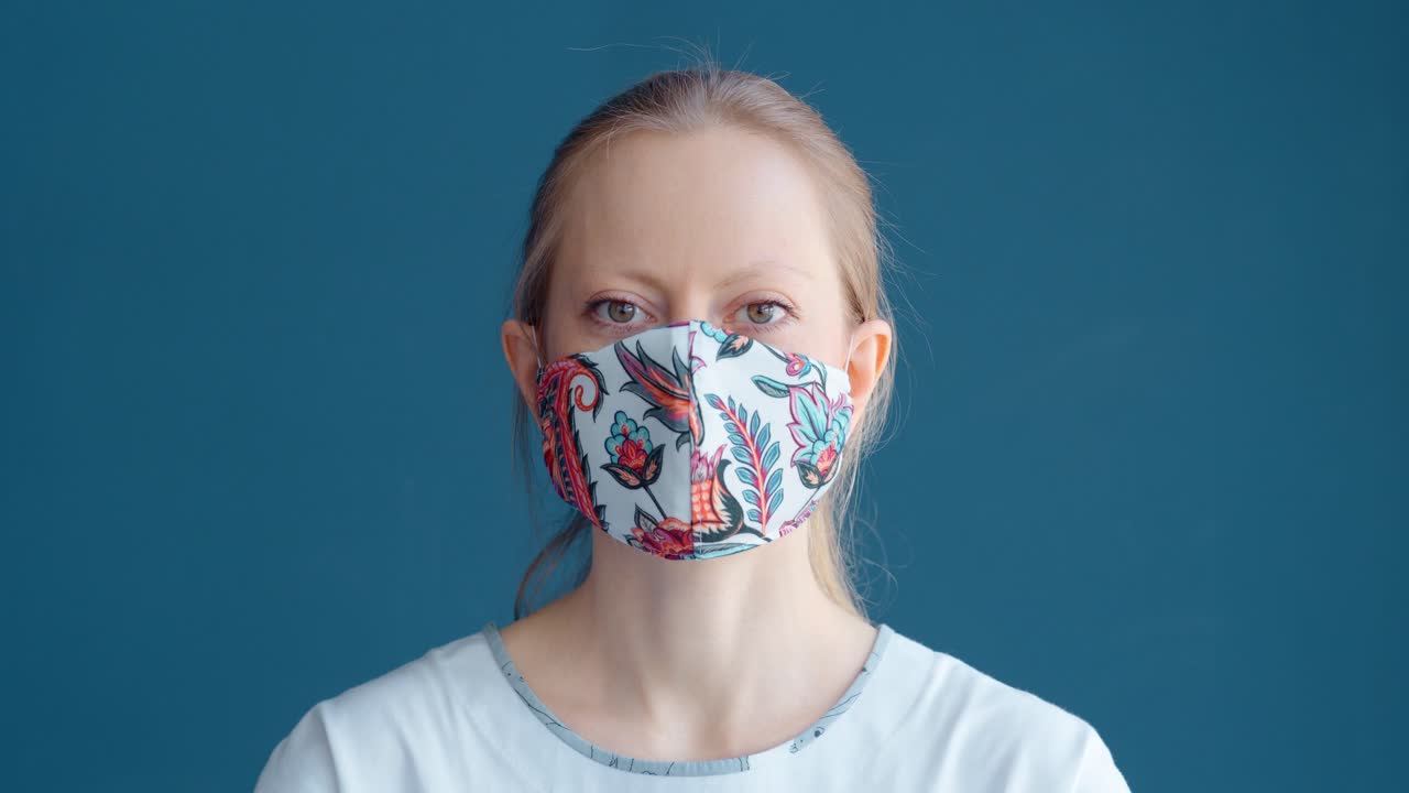 Woman Wearing a Floral Patterned Face Mask