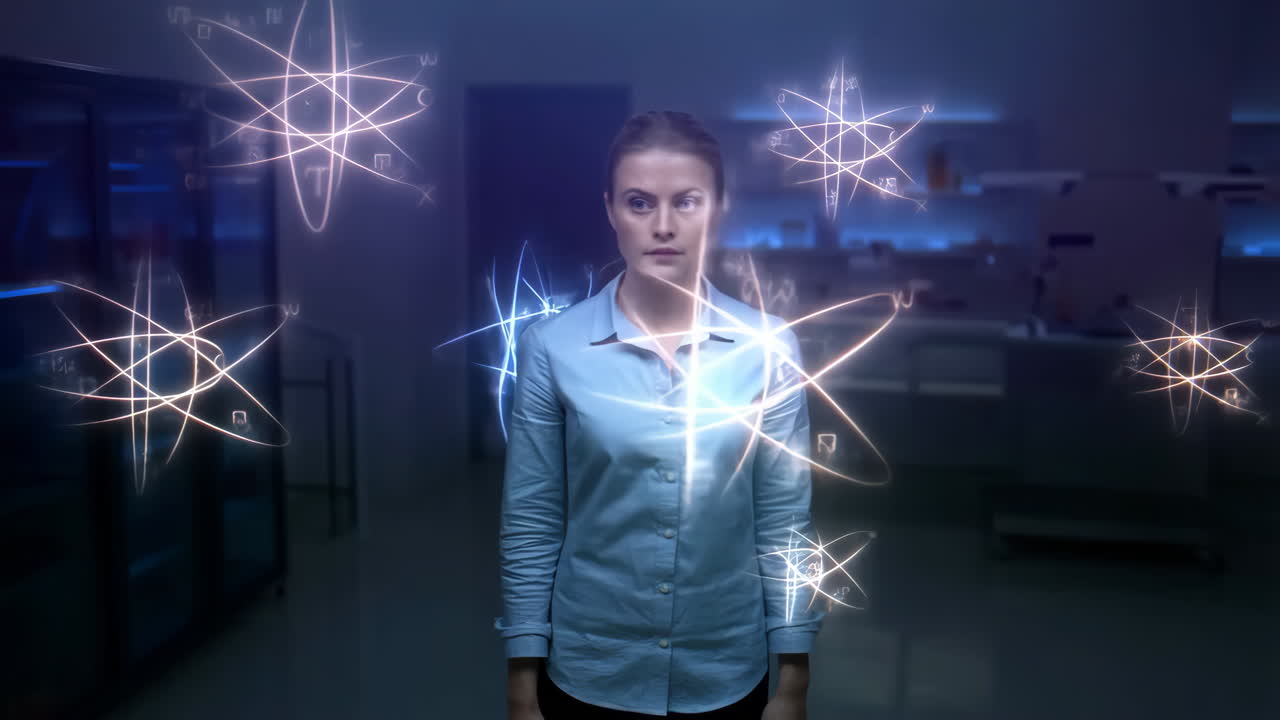 Woman surrounded by atom graphics in a laboratory