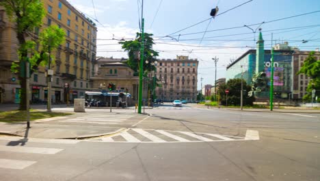 italy sunny day milan city famous traffic street square rotating panorama 4k timelapse