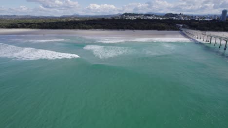 jet skier jet skiing at letitia beach near the tweed sand bypass in nsw, australia