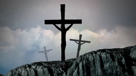 animation of silhouette of three christian crosses over clouds moving