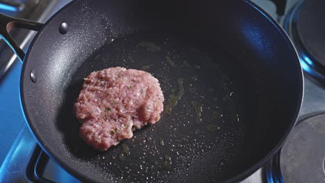 Frying-Raw-Ground-Turkey-Patties-In-Skillet