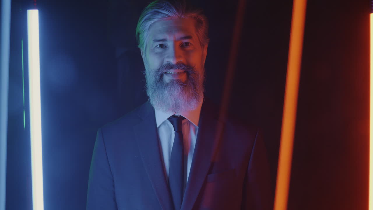 Mature Businessman in Neon Lighting