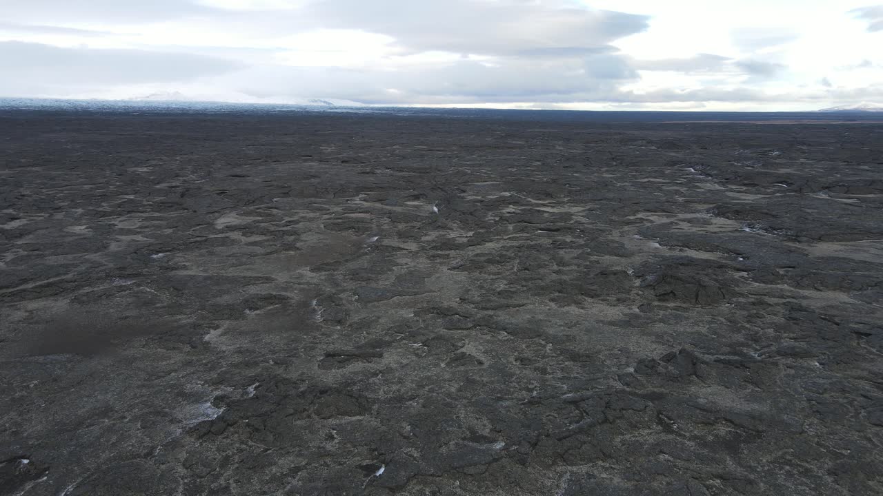 Big lava field and clouds