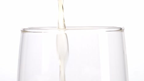 pouring beer into a glass