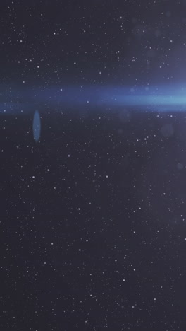 animation of glowing blue light over stars on night sky