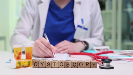 medical professional's desk with cystoscopy blocks and medical tools