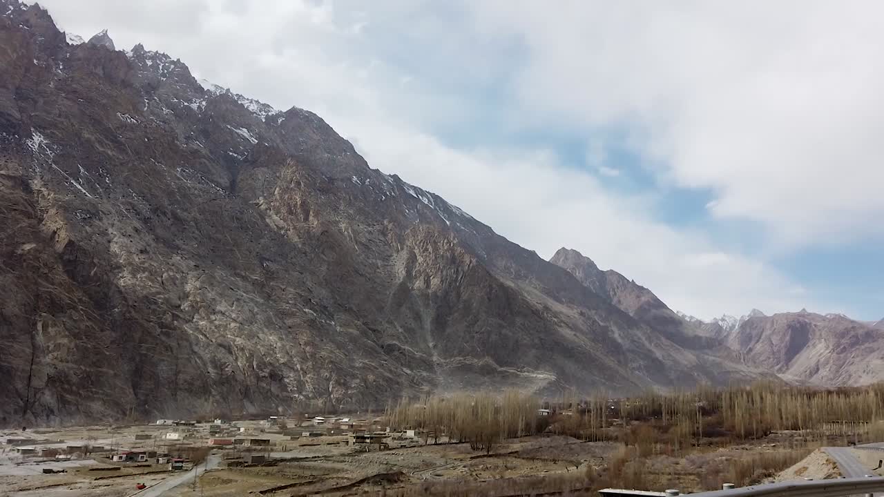 On Ride Shot In Hunza Valley, Gilgit Baltistan Northen Area Of Pakistan on The Karakoram Highway Surrounded by Mountains