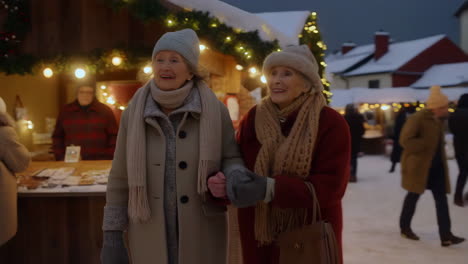 elderly women enjoying christmas market