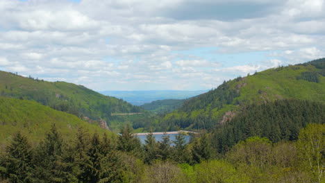 panoramic views across the loire valley showing lush alpine mountainsides and clear blue lakes