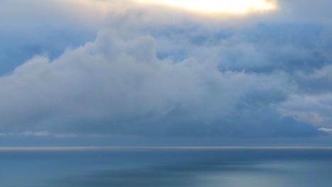 Blue-clouds-hang-over-the-ocean