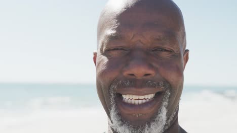 Montage-of-happy-african-american-family-spending-quality-time-together-at-beach,-in-slow-motion