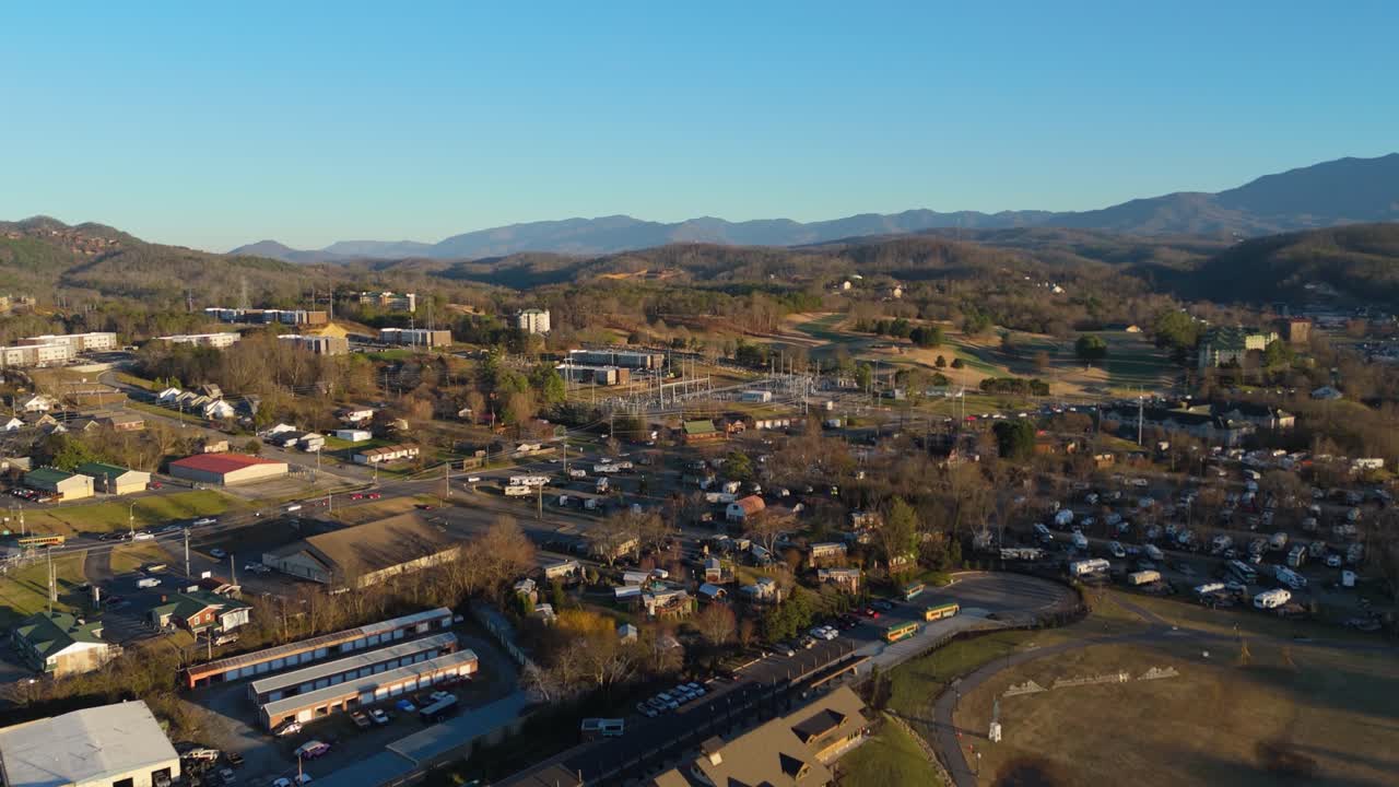 Aerial establishing shot of Piegon Forge, TN at sunset.