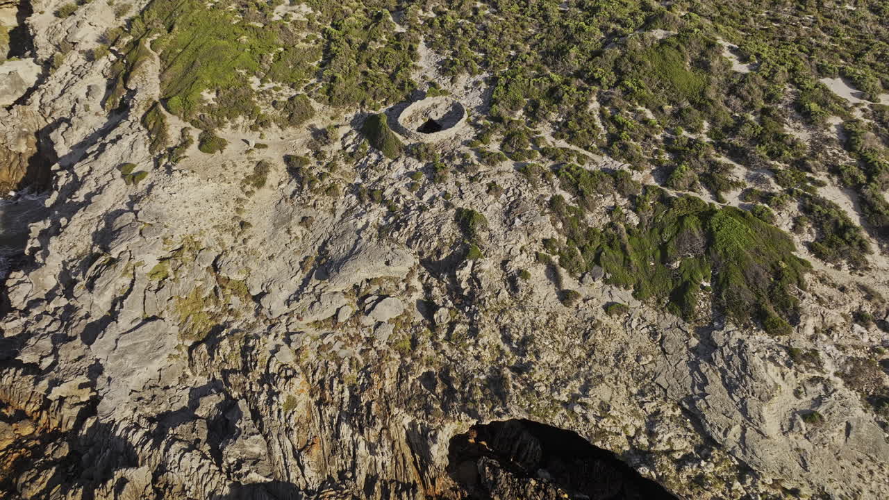 Gansbaai South Africa Aerial v32 birds eye view flyover Klipgat Caves capturing the ancient dwelling surrounded by spectacular coastal scenery at sunset - Shot with Mavic 3 Pro Cine - Jan 8th 2024