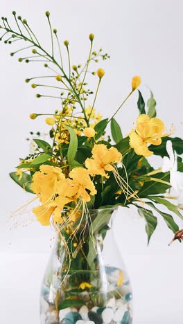 yellow flowers in vase