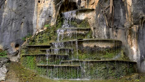 artificial cascading waterfall in the rock