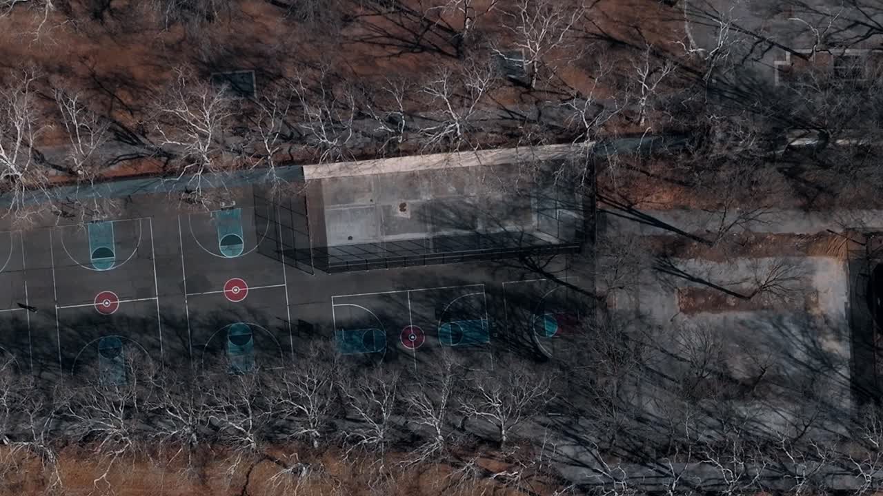 Basketball courts in New York park seen from above in winter season