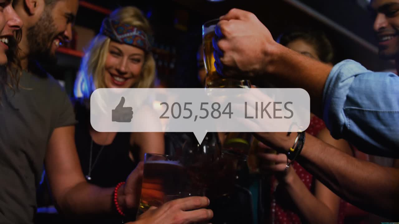Speech bubble with thumbs up icon and increasing numbers against group of friends making toast