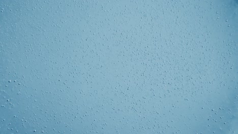 oxygen bubbles in water on a blue abstract background