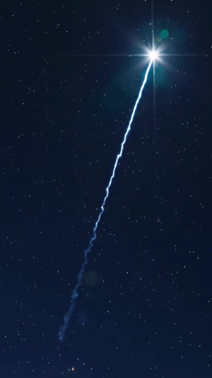 Vertical video: Appearing top, bright flare climbing at night, leaving zigzag trail and green orbs