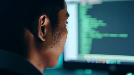 man coding at night