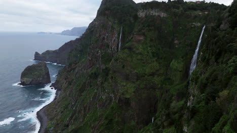 breathtaking view of waterfalls in rocha do navio mountain hike in madeira, portugal