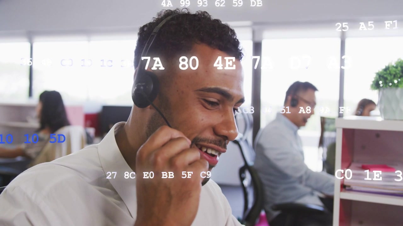 Male call agent bringing mic closer, assisting client over call while hex overlay showing data