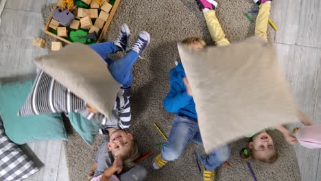 kids having fun with pillows