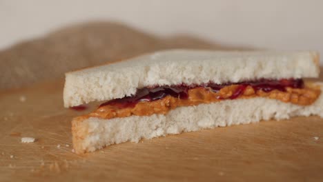 peanut butter and jelly, jam sandwich rotating, turning round, closeup, macro